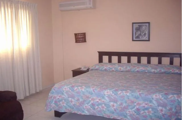 Apartahotel Drake Bolivar Santo Domingo habitacion cama king size
